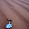 Time clock in sand.JPG